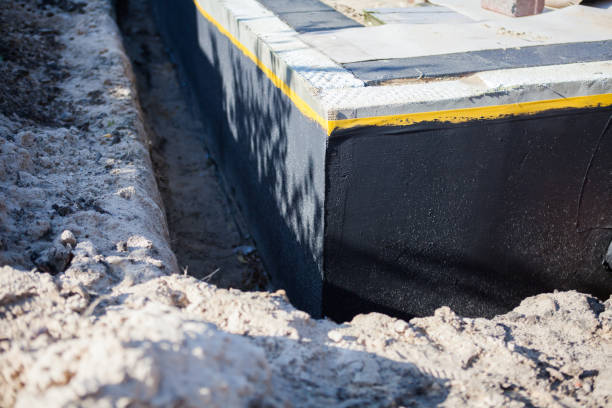 Professional Basement Waterproofing technician working in Sussex, WI
